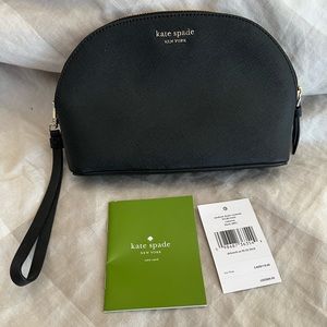 Brand new Kate Spade wristlet. Never been used! Still have the tags.